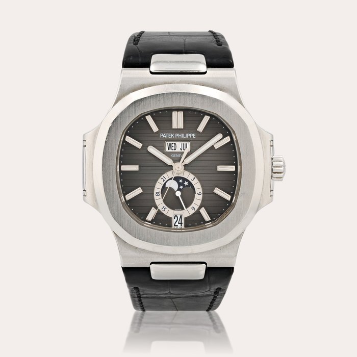 Patek Philippe Nautilus, reference 5726A-001    Montre bracelet calendrier annuel en acier avec phases de lune et indicateur 24h |  Stainless steel annual calendar wristwatch with moon phases and 24 hour indication    Vers 2011 |  Circa 2011
