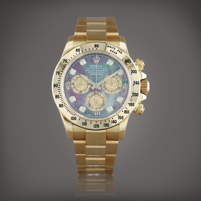 Rolex Daytona, reference 116528H Montre bracelet chronographe en or jaune sertie de diamants | Yellow gold diamond-set chronograph wristwatch with bracelet Vers 2014 | Circa 2014 · 116528H