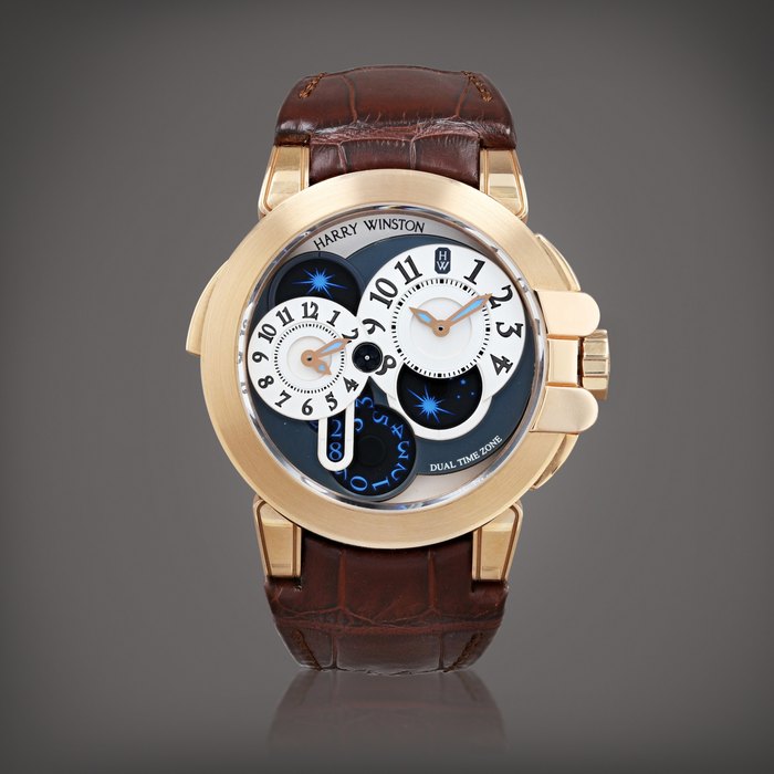 Harry Winston Ocean Dual time zone, reference 400-MATZ44RL.W    Montre bracelet à double fuseau horaire en or rose avec date et phases de lune |  Pink gold dual time zone wristwatch with date and moon phases    Vers 2009 |  Circa 2009