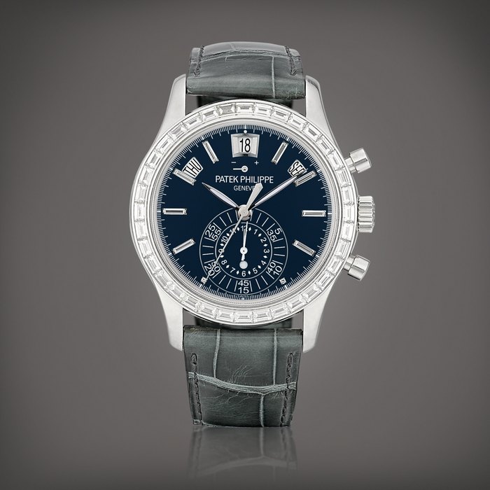 Patek Philippe Reference 5961 | A platinum and diamond-set annual calendar flyback chronograph wristwatch with power reserve and day and night indication, Circa 2012 | 百達翡麗 | 型號 5961 | 鉑金鑲鑽石年曆飛返計時腕錶，備動力儲備及晝夜顯示，約2012年製