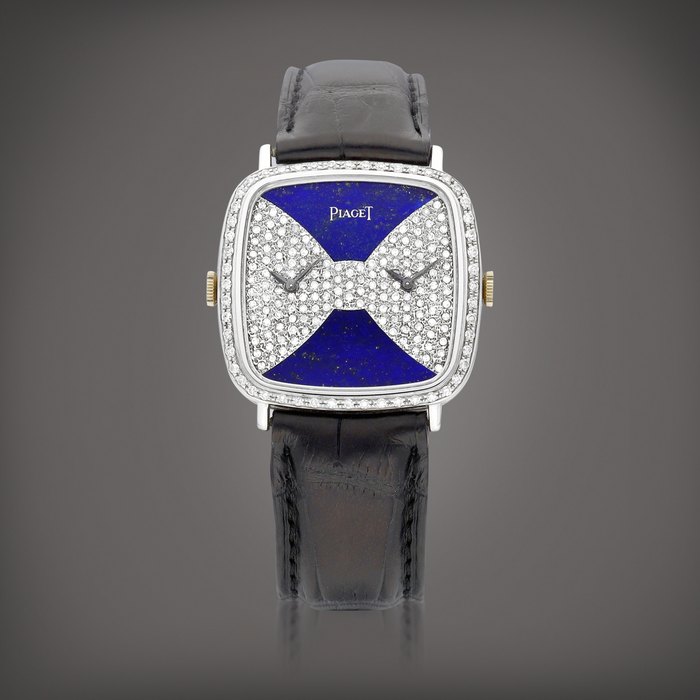 Piaget Reference 612775 | A white gold and diamond-set dual time zone wristwatch with lapis lazuli dial, Circa 1970 | 伯爵 | 型號612775 | 白金鑲鑽石兩地時間腕錶，備青金石錶盤，約1970年製