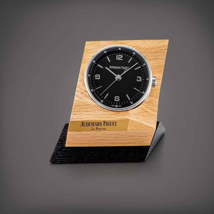 Audemars Piguet Code 11.59 | A stainless steel alarm desk clock with wooden stand, Circa 2020 | 愛彼 | Code 11.59 | 精鋼鬧鐘，備木製展示座，約2020年製