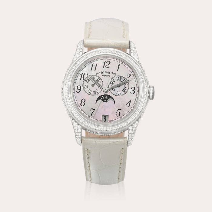 Patek Philippe Reference 4937 | A white gold and diamond-set annual calendar wristwatch with moon phases and mother-of-pearl dial, Circa 2010 | 百達翡麗 | 型號4937 | 白金鑲鑽石年曆腕錶，備月相顯示及珠母貝錶盤，約2010年製