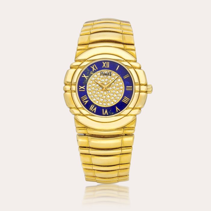 Piaget Tanagra, Reference 95041 | A yellow gold and diamond-set bracelet watch with lapis lazuli chapter ring, Circa 1990 | 伯爵 | Tanagra 型號95041 | 黃金鑲鑽石鏈帶腕錶，備青金石時標環，約1990年製