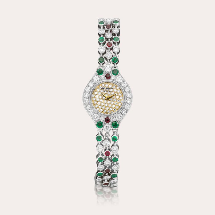 Chopard Reference 4053 | A white gold, diamond, emerald and ruby-set bracelet watch, Circa 1990 | 蕭邦 | 型號4053 | 白金鑲鑽石、祖母綠及紅寶石鏈帶腕錶，約1990年製
