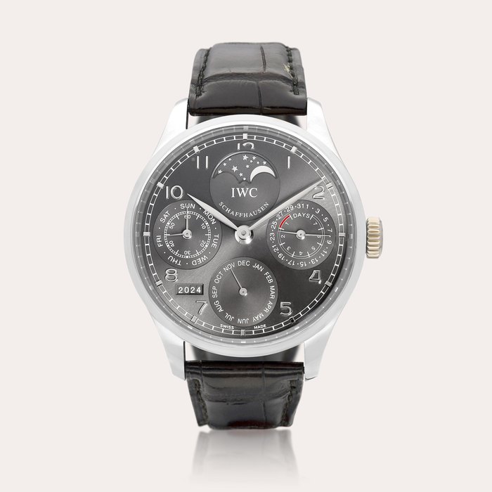 IWC Portugieser Perpetual Calendar, Reference IW502303 | A white gold perpetual calendar wristwatch with moon phases, digital year display and 7 days power reserve indication, Circa 2015 | 萬國 | 葡萄牙系列萬年曆 型號IW502303 | 白金萬年曆腕錶，備月相、數位年份及7天動力儲備顯示，約2015年製