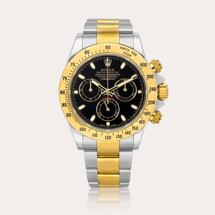 Rolex Cosmograph Daytona, Reference 116523 | A yellow gold and stainless steel chronograph wristwatch with bracelet, Circa 2014 | 勞力士 | Cosmograph Daytona 型號116523 | 黃金精鋼計時鏈帶腕錶，約2014年製