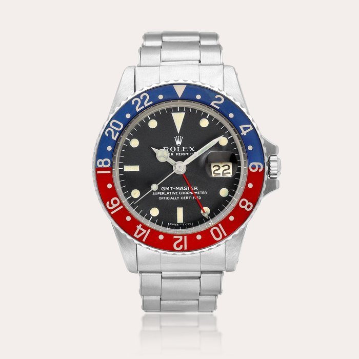 Rolex GMT-Master ‘Pepsi Long E’, Reference 1675 | A stainless steel dual time wristwatch with date and bracelet, Circa 1967 | 勞力士 | GMT-Master ‘Pepsi Long E’ 型號1675 | 精鋼兩地時間鏈帶腕錶，備日期顯示，約1967年製 · 1675