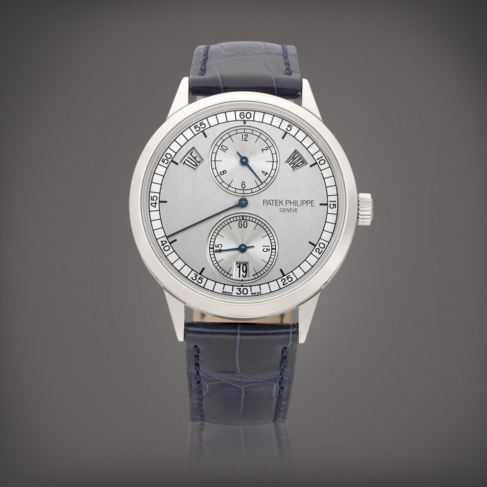 Patek Philippe Reference 5235 | A white gold annual calendar wristwatch with regulator dial, Circa 2012 | 百達翡麗 | 型號5235 | 白金年曆腕錶，備規範指針錶盤，約2012年製