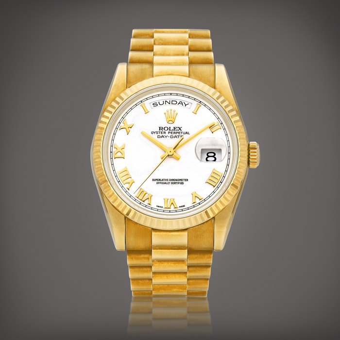 Rolex Day-Date, Reference 118238 | A yellow gold wristwatch with date and bracelet, Circa 2000 | 勞力士 | Day-Date 型號118238 | 黃金鏈帶腕錶，備日期及星期顯示，約2000年製