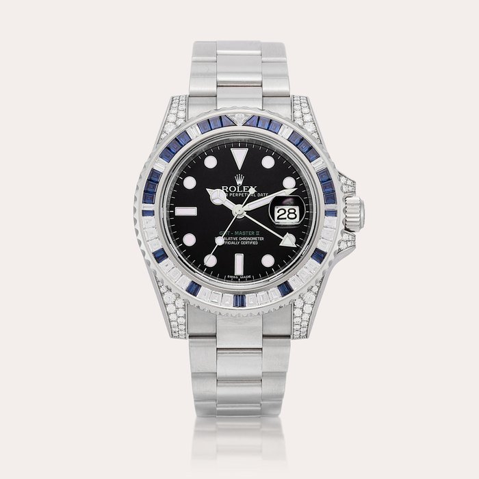 Rolex GMT-Master II, Reference 116759SA | A white gold, diamond and sapphire-set dual time wristwatch with date and bracelet, Circa 2008 · 116759SA