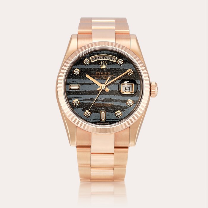 Rolex Day-Date, Reference 118235 | An Everose gold and diamond-set wristwatch with day, date, ferrite dial and bracelet, Circa 2018