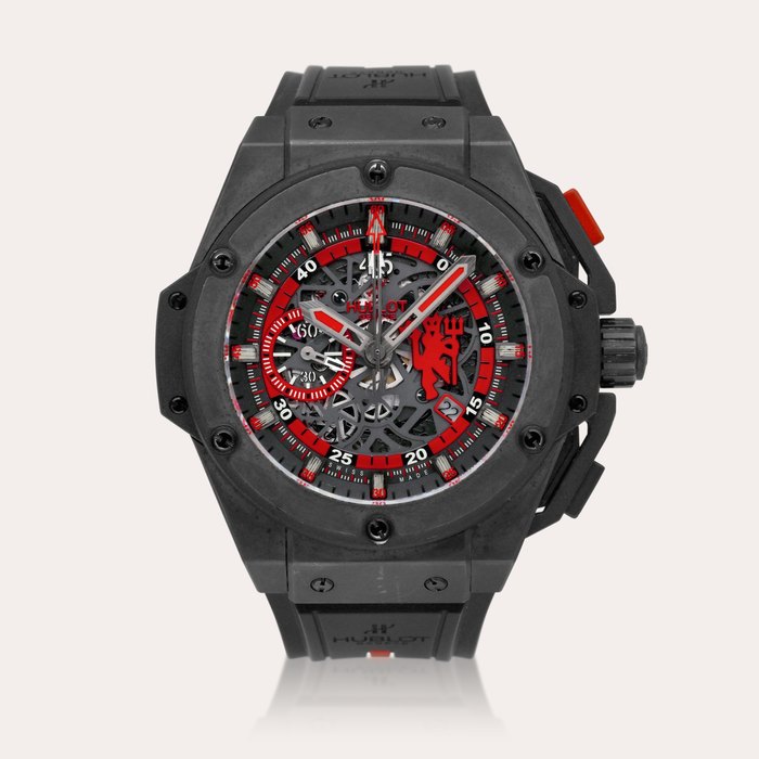 Hublot King Power Red Devil "Manchester United", Reference 716.CI.1129.RX.MAN11 | A limited edition ceramic and titanium semi-skeletonised chronograph wristwatch with date, Circa 2012