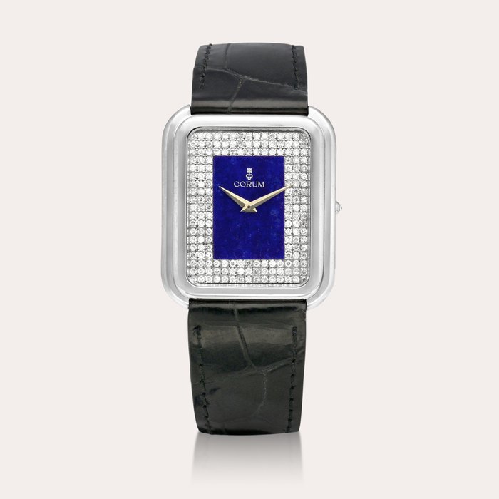 Corum Reference 27118 | A white gold and diamond-set wristwatch with lapis lazuli dial, Circa 1975