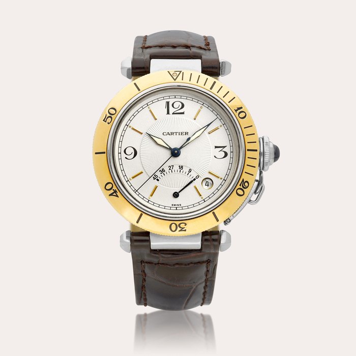 Cartier Pasha, Reference 1033 | A yellow gold and stainless steel wristwatch with date and power reserve indication, Circa 1990
