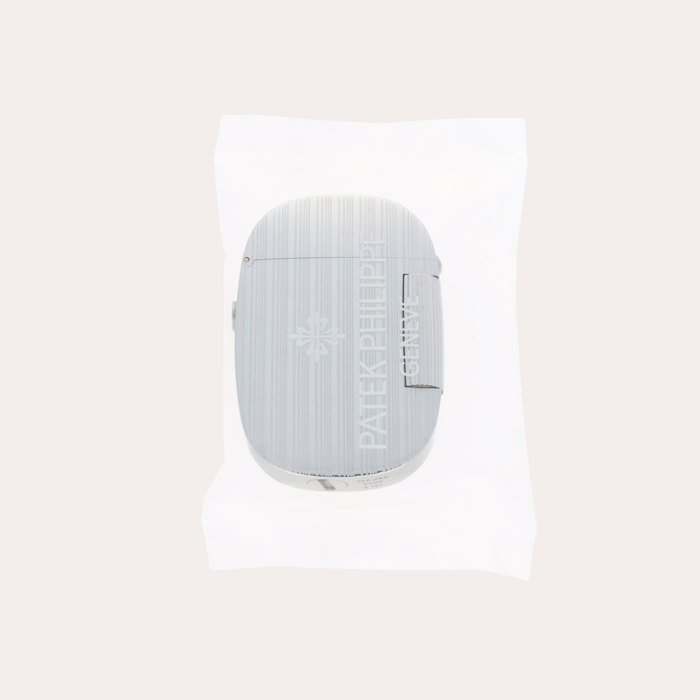 Patek Philippe Golden Ellipse, Reference 9502 | A service sealed white gold lighter | Circa 1980