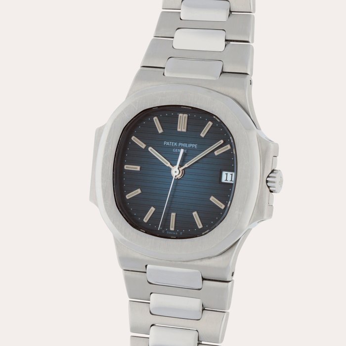 Patek Philippe Nautilus, Reference 3800/001A | A stainless steel wristwatch with date and bracelet | Circa 1994