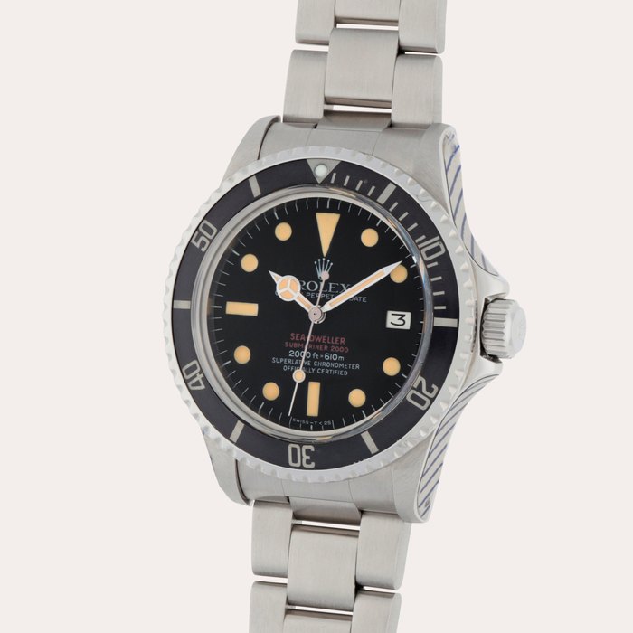 Rolex Sea-Dweller 'Double Red', Reference 1665 | A stainless steel wristwatch with date and helium escape valve | Circa 1976