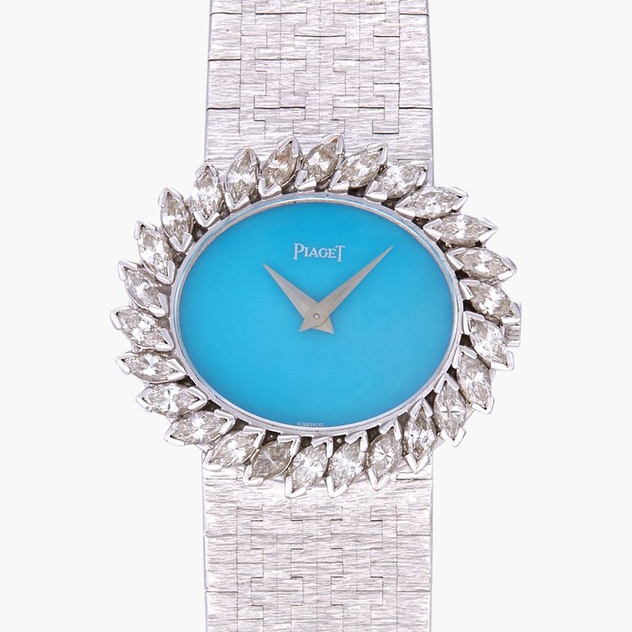 Piaget Reference 9329 A66 | A white gold and diamond-set bracelet watch with turquoise dial | Circa 1971