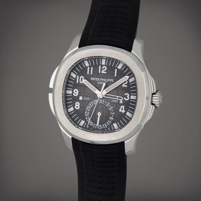 Patek Philippe Aquanaut Travel Time, Reference 5164A-001 | A stainless steel dual time zone wristwatch with date and dual day/night indication | Circa 2021A-001 Mov.7377261/6399771 Cal. 324 S C FUS