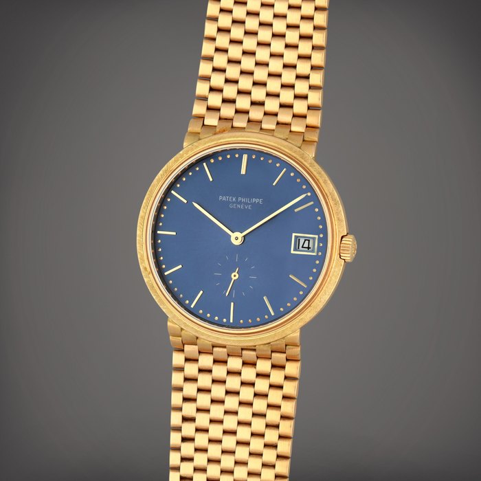 Patek Philippe Reference 3445/6 | A yellow gold wristwatch with date and integrated bracelet | Circa 1972