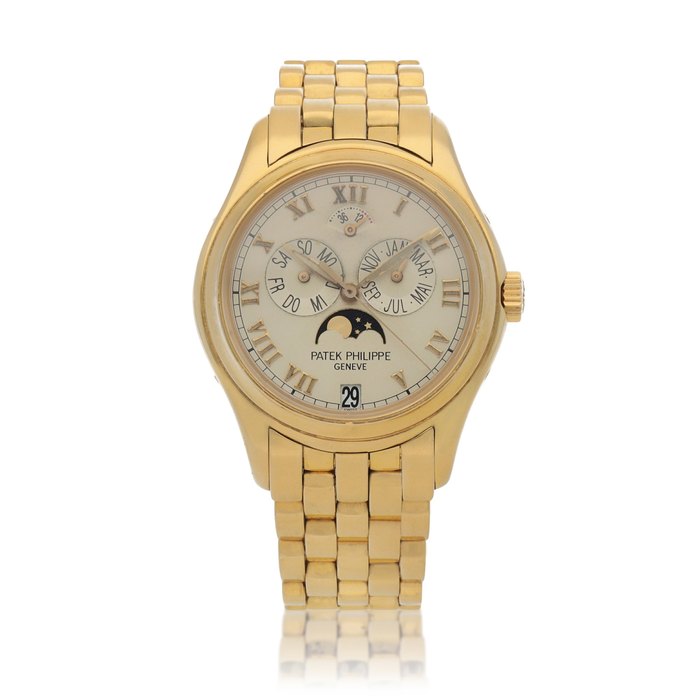 Patek Philippe Ref. 5036/1J Yellow gold annual calendar wristwatch with moon phases, power reserve indication and bracelet Circa 2001