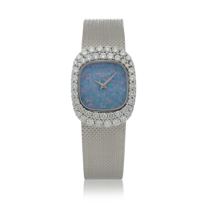 Patek Philippe Ref. 4392/1 White gold and diamond-set bracelet watch with opal dial Circa 1980 · 4392/1