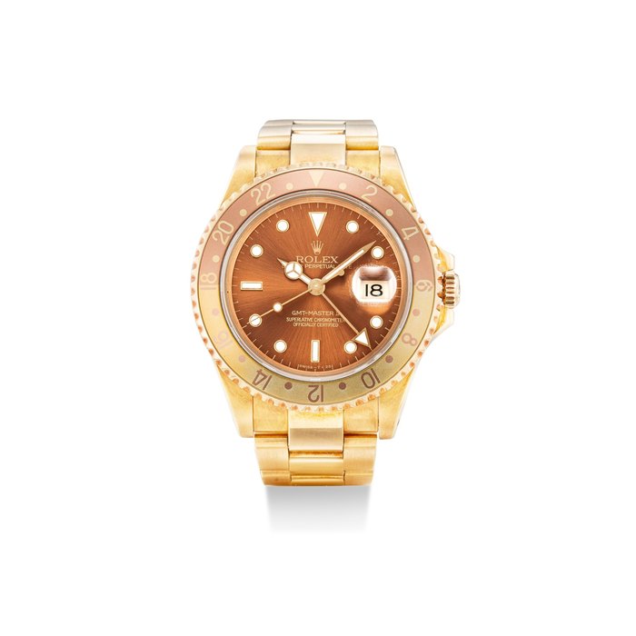 Rolex REFERENCE 16718 GMT-MASTER II  A YELLOW GOLD WRISTWATCH WITH DATE AND BRACELET, CIRCA 1993