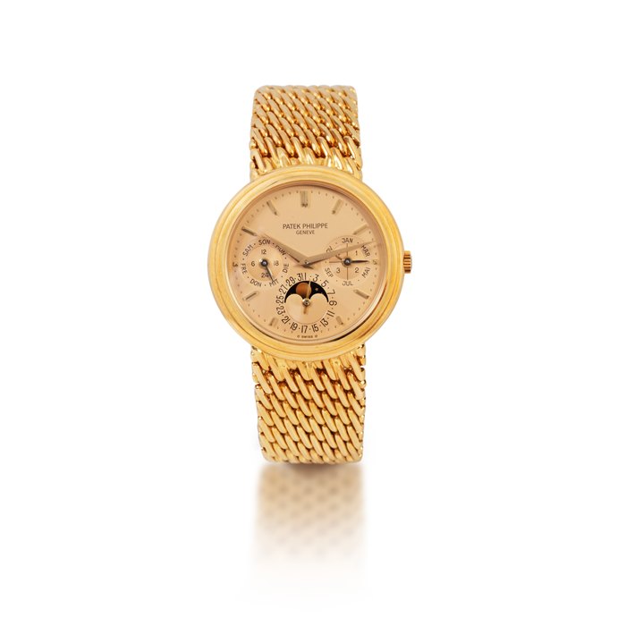 Patek Philippe Ref. 3945    Montre bracelet en or jaune avec quantième perpétuel, année bissextile, phases de lune et indication 24 heures |  Yellow gold perpetual calendar bracelet watch with moon phases, 24-hour and leap-year indication    Vers 1989 |  Circa 1989