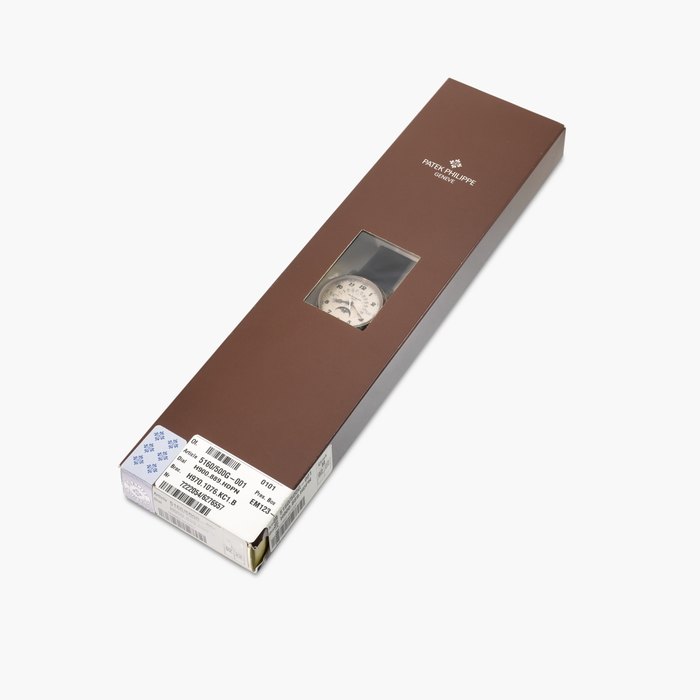 Patek Philippe Reference 5160/500G-001 | A double sealed white gold perpetual calendar wristwatch with day, retrograde date, moon phases, leap year indication and hand-engraved case  | Circa 2022 · 5160/500G-001