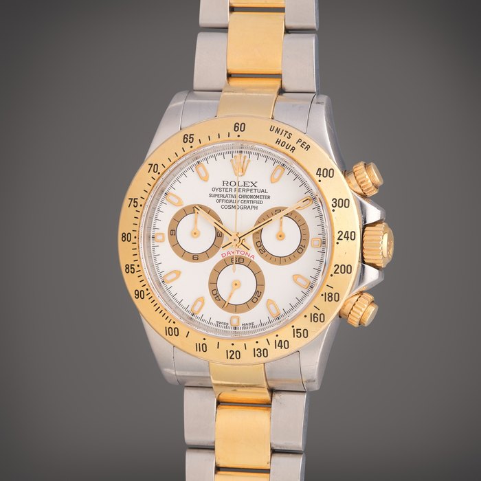Rolex Reference 116523 Daytona | A stainless steel and yellow gold automatic chronograph wristwatch with bracelet, Circa 2004