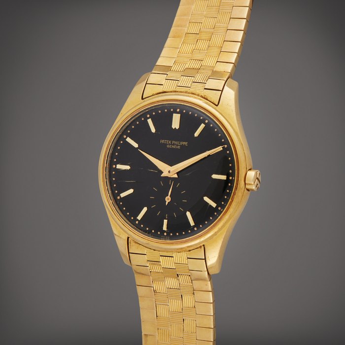 Patek Philippe Reference 3428 | A yellow gold automatic wristwatch with black dial, Circa 1961 · 3428