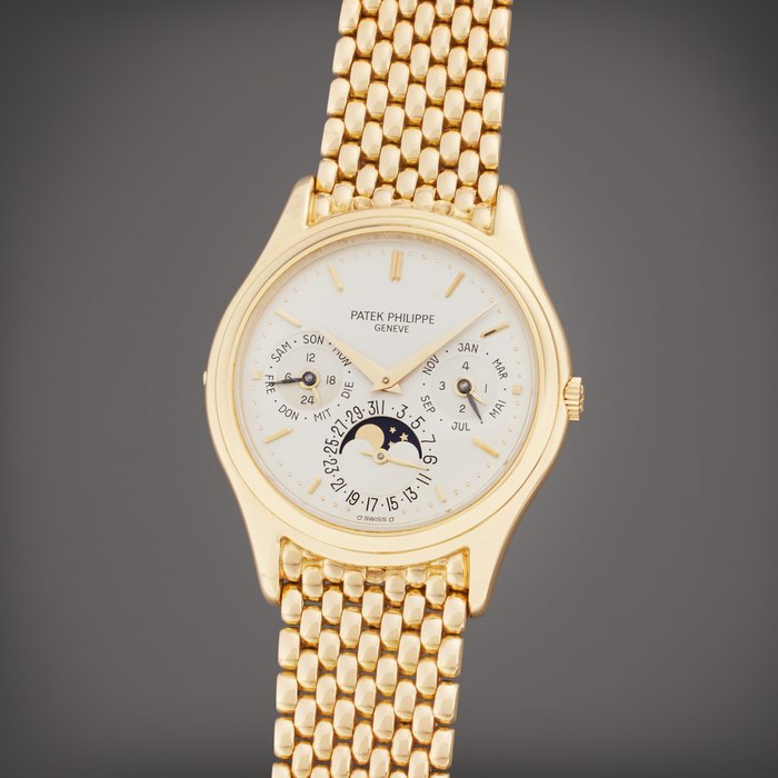 Patek Philippe Reference 3940 | A yellow gold automatic perpetual calendar bracelet watch with moon phases, 24 hour indication, and leap year indication, Made in 1987 · 3940