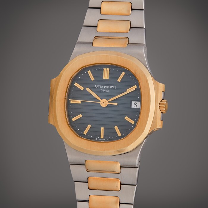 Patek Philippe Reference 3800/1JA Nautilus | A stainless steel and yellow gold automatic wristwatch with date and bracelet, Circa 1996 · 3800/1JA