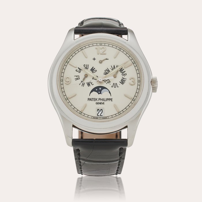 Patek Philippe Reference 5146G-001 | A white gold automatic annual calendar wristwatch with moon phases and power reserve indication, Made in 2005