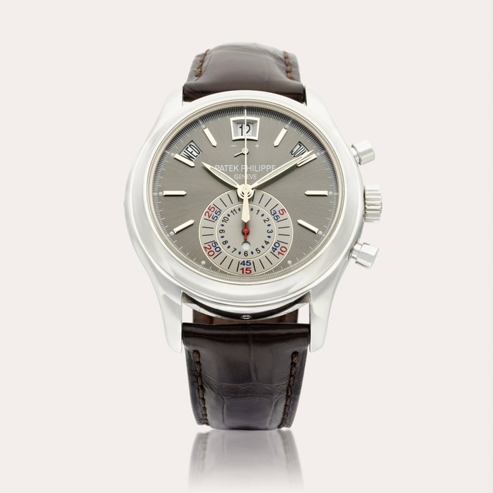 Patek Philippe Reference 5960P-001 |  A platinum automatic annual calendar flyback chronograph wristwatch with power reserve and day/night indication, Circa 2006