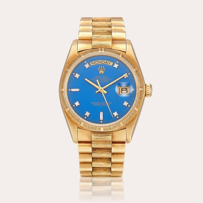 Rolex Day-Date "Stella", Reference 18078 A yellow gold and diamond-set wristwatch with day, date, stella dial and bracelet, Circa 1979 | 勞力士 | DAY-DATE "STELLA" 型號18078 | 黃金鑲鑽石鏈帶腕錶，備日期、星期顯示及 "STELLA" 錶盤，約1979年製 · 18078