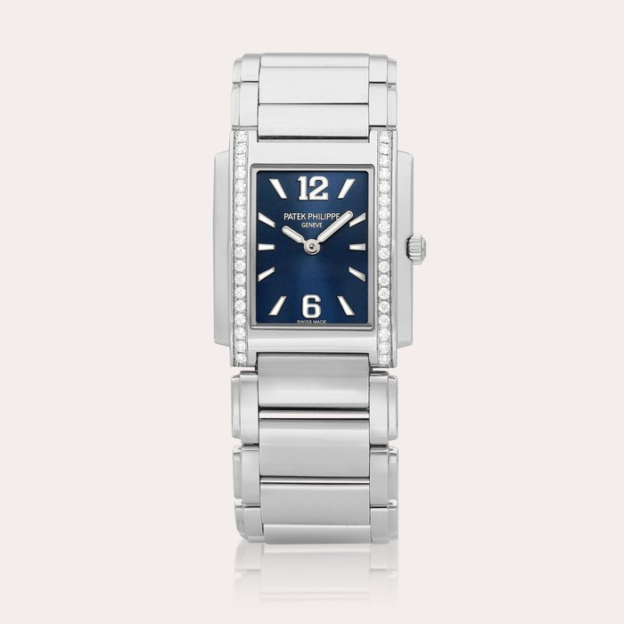 Patek Philippe Twenty~4, Reference 4910/1200 | A stainless steel and diamond-set bracelet watch, Circa 2023 | 百達翡麗 | Twenty~4 型號4910/1200 | 精鋼鑲鑽石鏈帶腕錶，約2023年製 · 4910/1200