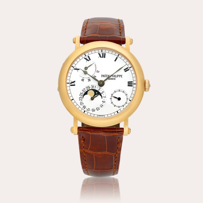 Patek Philippe Reference 5054 | A pink gold wristwatch with moon phases, date and power reserve indication, Circa 2000 | 百達翡麗 | 型號5054 | 粉紅金腕錶，備月相、日期及動力儲備顯示，約2000年製 · 5054