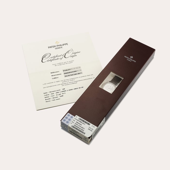 Patek Philippe Reference 5134 | A white gold dual time zone wristwatch with 24 hour indication, In double factory seal, Circa 2008 | 百達翡麗 | 型號5134 | 白金兩地時間腕錶，備24小時顯示，原廠未開封，約2008年製 · 5134
