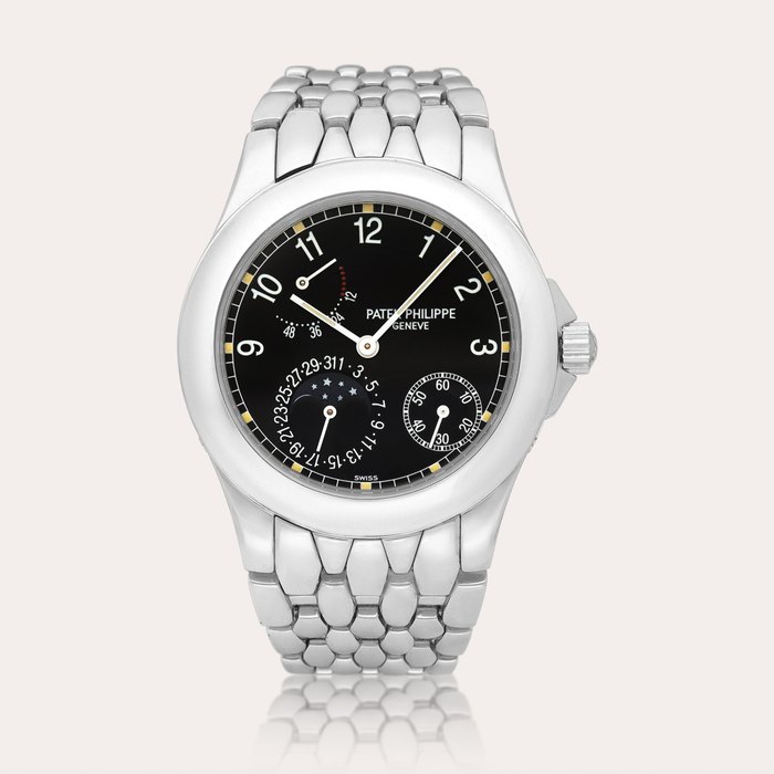 Patek Philippe Neptune, Reference 5085 | A stainless steel wristwatch with moon phases, date and power reserve indication, Circa 2001 | 百達翡麗 | Neptune 型號5085 | 精鋼鏈帶腕錶，備月相、日期及動力儲備顯示，約2001年製 · 5085