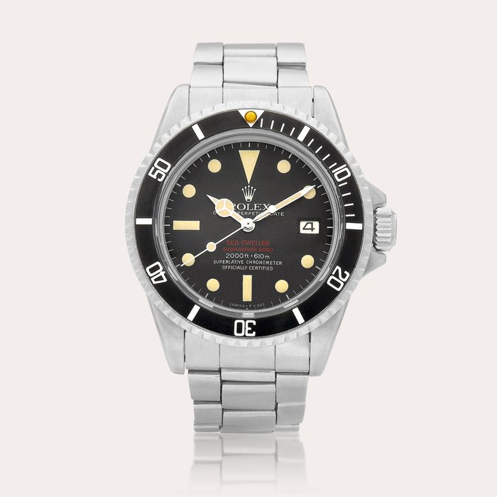 Rolex Submariner 'Double Red Sea-Dweller', Reference 1665 | A stainless steel wristwatch with date and bracelet, Circa 1974 | 勞力士 | Submariner 'Double Red Sea-Dweller' 型號1665 | 精鋼鏈帶腕錶，備日期顯示，約1974年製 · 1665