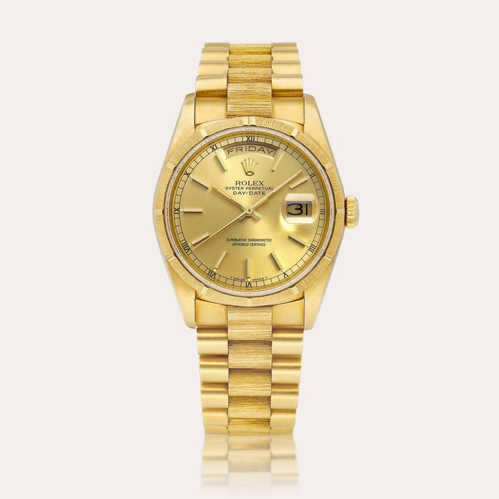 Rolex Day-Date, Reference 18248 | A yellow gold wristwatch with day, date and bracelet, Circa 1991 | 勞力士 | Day-Date 型號18248 | 黃金鏈帶腕錶，備日期及星期顯示，約1991年製 · 18248