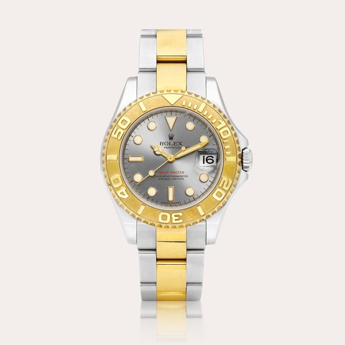 Rolex Yacht-Master, Reference 168623 | A yellow gold and stainless steel wristwatch with date and bracelet, Circa 2013 | 勞力士 | Yacht-Master 型號168623 | 黃金及精鋼鏈帶腕錶，備日期顯示，約2013年製 · 168623