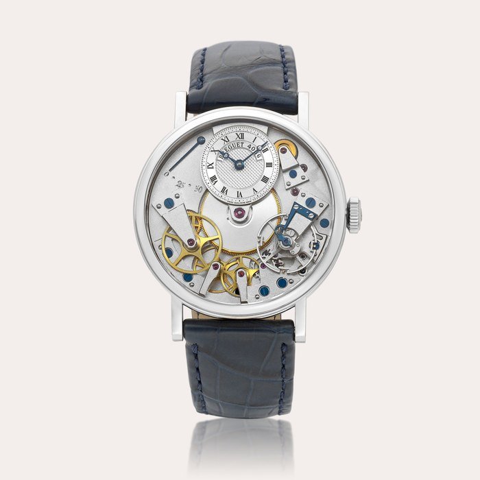 Breguet La Tradition, Reference 7027 | A white gold semi-skeletonised wristwatch with power reserve indication, Circa 2007 | 寶璣 | La Tradition 型號7027 | 白金半鏤空腕錶，備動力儲備顯示，約2007年製 · 7027