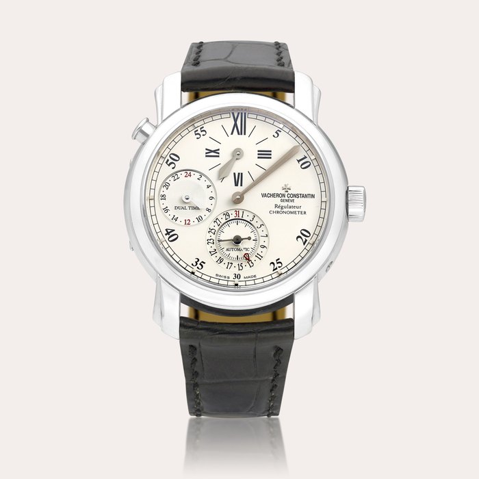 Vacheron Constantin Malte Regulator, Reference 42005 | A white gold dual time wristwatch with date and regulator dial, Manufactured in 2002 | 江詩丹頓 | Malte Regulator 型號42005 | 白金兩地時間腕錶，備日期顯示及規範指針錶盤，2002年製 · 42005