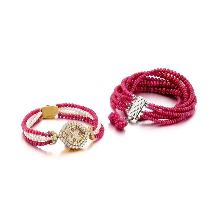 DeLaneau Reference G249 | A yellow gold, diamond and ruby-set bracelet watch with multi-strand ruby and cultured pearl bracelet and a matching multi-strand ruby-set bracelet, Circa 1990 | 型號G249 | 黃金鑲鑽石及紅寶石鏈帶腕錶，備紅寶石及珍珠鏈帶，附帶紅寶石鏈帶，約1990年製 · G249