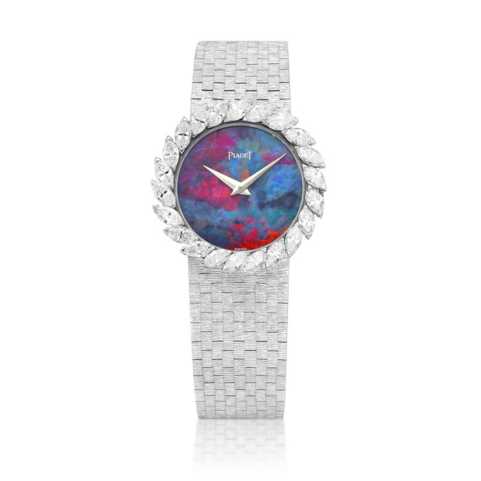Piaget Reference 924 | A white gold and diamond-set bracelet watch with opal dial, Circa 1970 | 伯爵 | 型號924 | 白金鑲鑽石鏈帶腕錶，備蛋白石錶盤，約1970年製