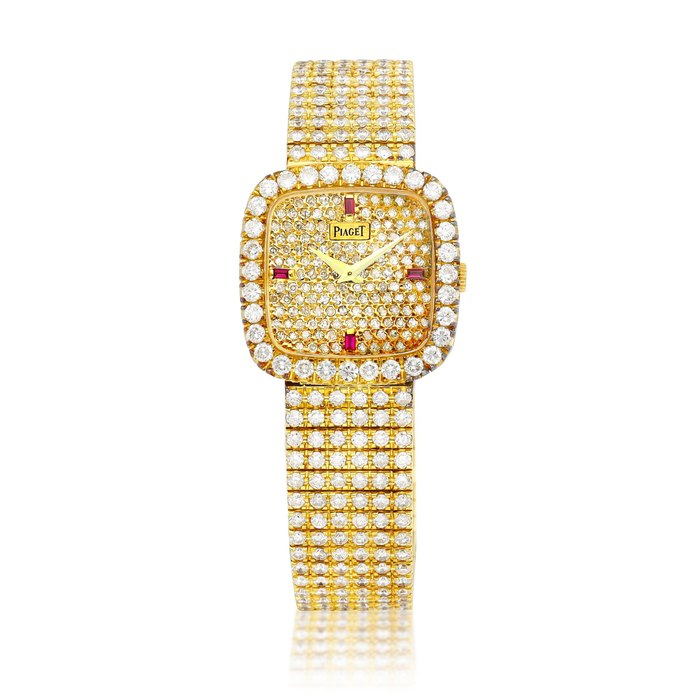 Piaget Reference 9902 | A yellow gold, diamond and ruby-set bracelet watch, Circa 1980 | 伯爵 | 型號9902 | 黃金鑲鑽石及紅寶石鏈帶腕錶，約1980年製