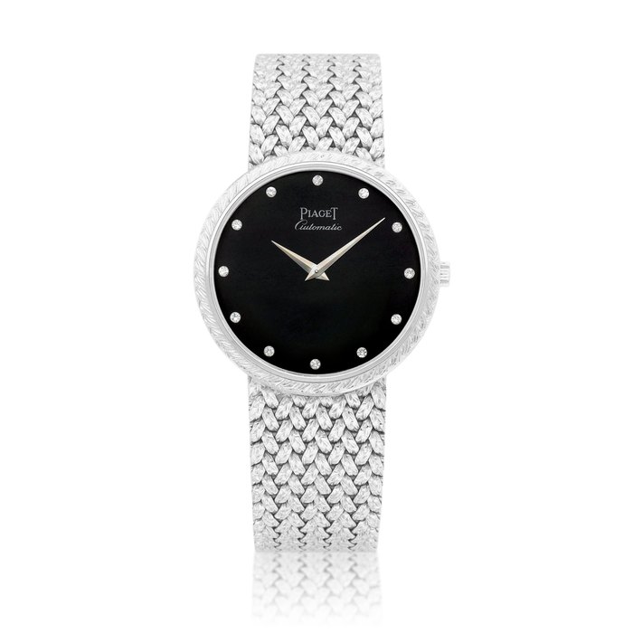 Piaget Reference 12343 D 2 | A white gold and diamond-set bracelet watch with onyx dial, Circa 1970 | 伯爵 | 型號12343 D 2 | 白金鑲鑽石鏈帶腕錶，備瑪瑙錶盤，約1970年製 · 12343